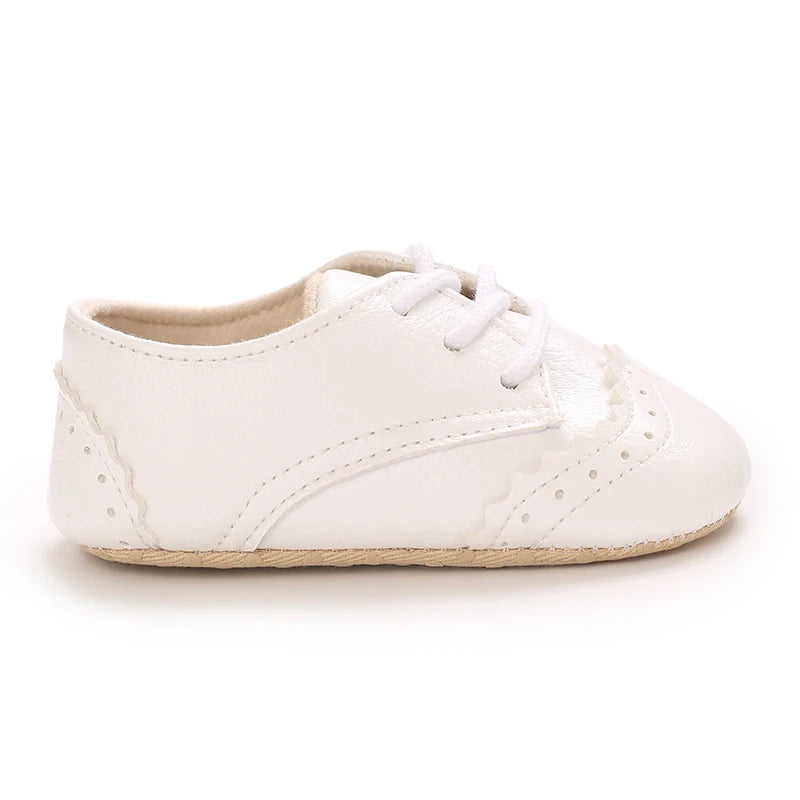 sapato bebê social, sapato bebê masculino, sapato bebê batizado, sapato social infantil, sapato bebê festa, sapato bebê casamento, sapato bebê clássico, sapato bebê elegante, sapato bebê conforto