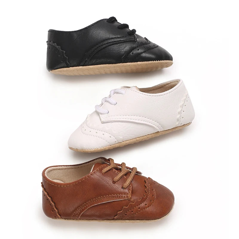sapato bebê social, sapato bebê masculino, sapato bebê batizado, sapato social infantil, sapato bebê festa, sapato bebê casamento, sapato bebê clássico, sapato bebê elegante, sapato bebê conforto