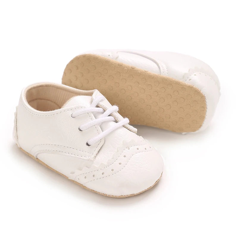 sapato bebê social, sapato bebê masculino, sapato bebê batizado, sapato social infantil, sapato bebê festa, sapato bebê casamento, sapato bebê clássico, sapato bebê elegante, sapato bebê conforto